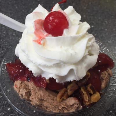 Single Dip Sundae       German chocolate ice cream, cherry topping, pecans and whip cream.