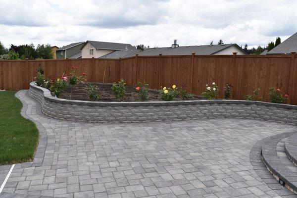 Just finished another yard, we really like the small retaining wall for the flower bed.