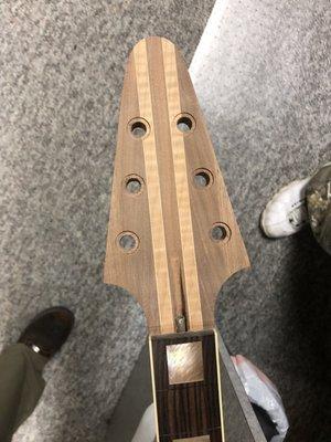 Trusted Kustom Guitar Shop 2023 Builds...
 Flying V,
  Walnut and flamed maple neck, Makassar ebony fretboard and brown lip pearl inlays.