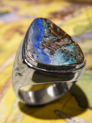 A one-of-a-kind custom ring made by owner, Albert Drake. Sterling silver and boulder opal.