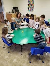 Learning traditional French recipes together in the school kitchen