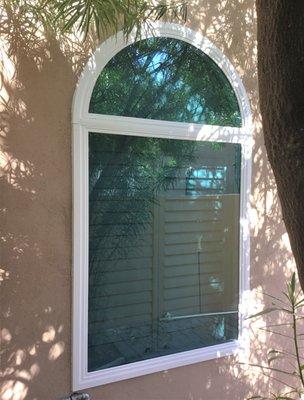 Geometric Picture window replacement with Low-E glass and Interior shutters!