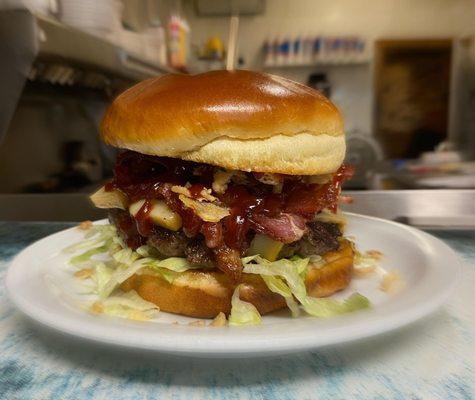 The Rifleman- Smoked cheese (smoked in house), bbq sauce (made in house), bacon and crispy onion straws!