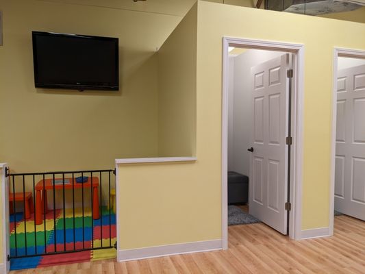 Dressing rooms right next to the play area so you can try on your clothes while keeping your kiddos close by.