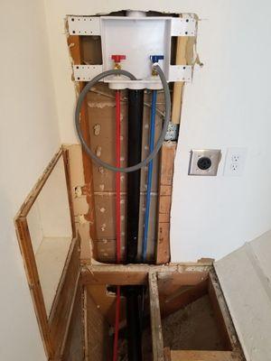 Washer and dryer plumbing.