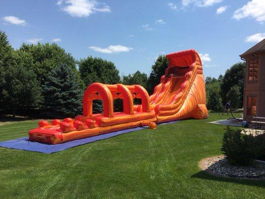 Inflatable 22' tall Waterslide with a slip and slide