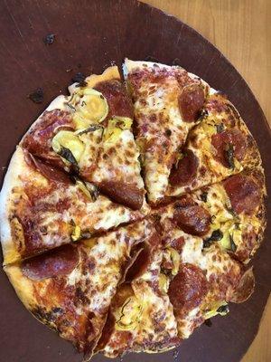 Pepperoni and banana peppers on hand tossed crust.