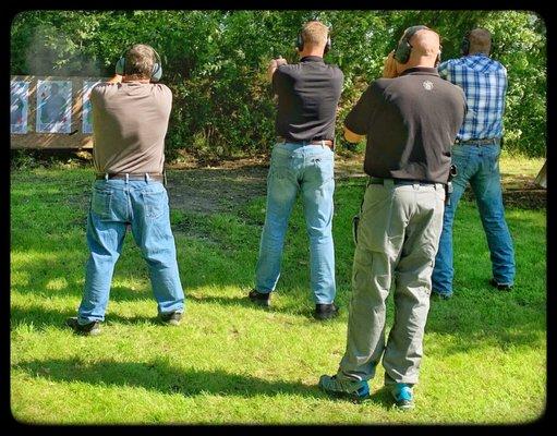 Our Owner, Benji, instructing some students at the beginning of our Advanced Pistol firearms training course.