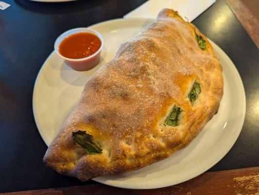 Spinach and ricotta calzone.  This thing is HUGE!