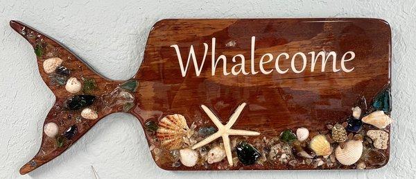 Whalecome sign