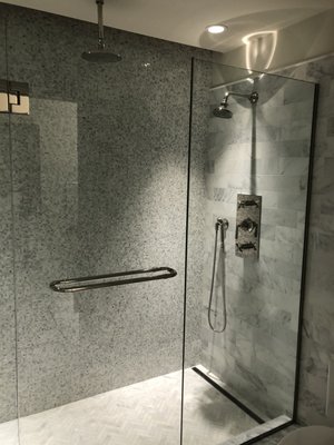 Installation of rainhead shower and shower valve. Customer request.