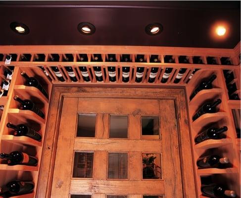 Custom wine doors and lighting, built especially for wine storage.