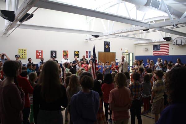 As a community, we gather for school assemblies to honor National days together.