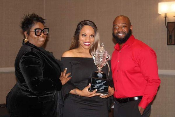 LCSA CEO Terrell Jenkins and Master Coach/ Instructor Rhonda Caldwell honoring Coach Lenetria Wilkins at the LCSA award ceremony.