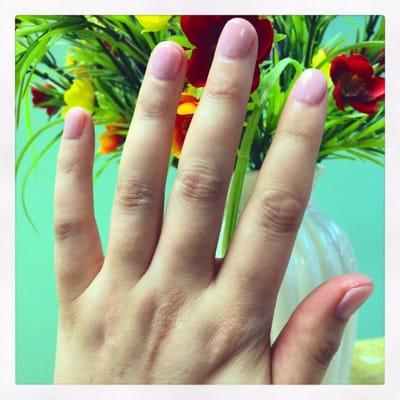 Nails saved with a baby pink gel manicure.