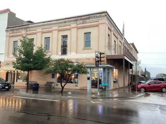 We are at the corner of W Holland Ave & 6th Street, in the Old Holland Hotel. Our Location housed one of the first banks in Alpine.