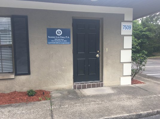 Picture of the front door of Sammis Law Firm in New Port Richey, FL, for criminal and DUI defense.