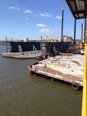 Floating work barge.