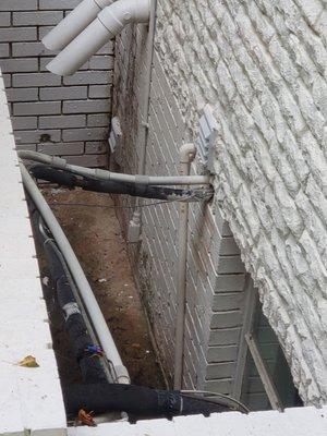 Hanging leaking pipe in mote