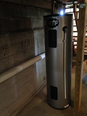 New HTP 50-gallon stainless steel electric water heater, installed in new location