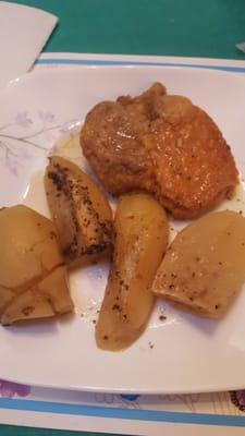 Breaded pork chop with Greek potatoes