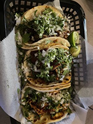 Carnitas, brisket and chicken tacos