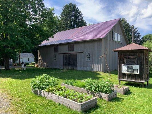 Photo of the historic barn and additional buildings located at the Chenango County Historical Society campus.