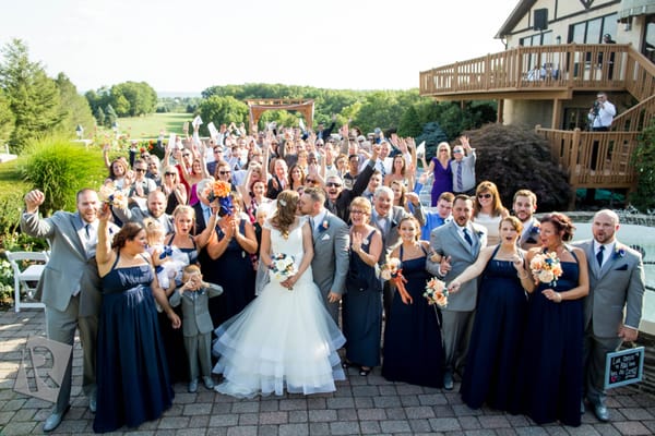 Capturing The Ceremony Family Moment for Rockin' Ramaley is http://www.delorenzophoto.com