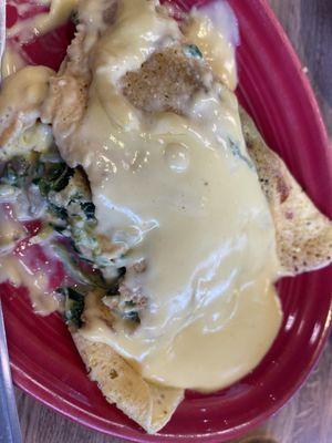 Spinach mushroom omelette with hollandaise sauce