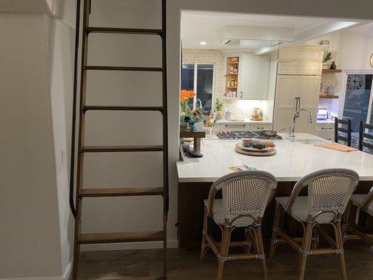 Ladder to the loft above kitchen