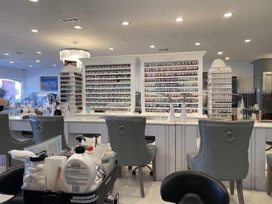 Very organized nail polish selection. You pick out your nail colors from books organized by polish brand!