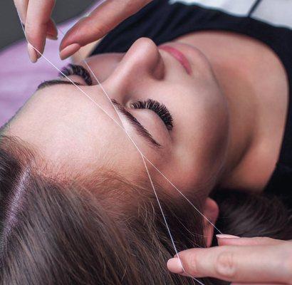 Threading is the process of hair removal via the use of a white cotton thread.