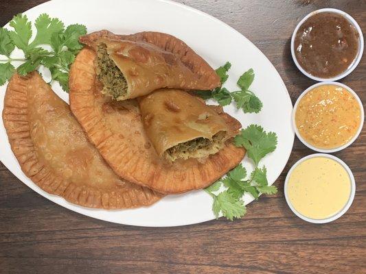 Saltfish and Callaloo Empanadas.