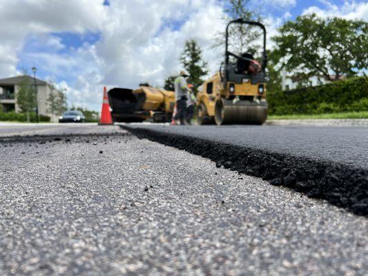 Commercial Asphalt Paving - Final 3/4" asphalt lift being applied in Pompano Beach applied