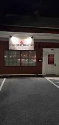 Night shot of The Mercy Ministry center