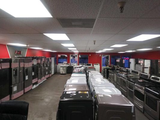 Showroom w/ fridges, washers, dryers, stoves & more!