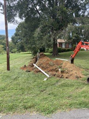 On this project we took owner from septic to City sewer. Installed 200' of new sewer line.