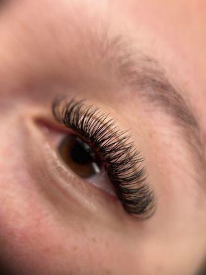 Hybrid lash extensions by our esthetician, Jenna