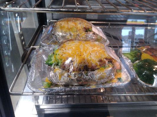 Overstuffed broccoli, cheese and grilled chicken baked potato