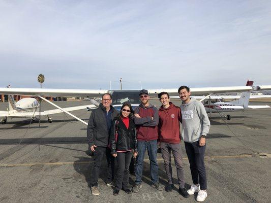 Proud parents, Captain Chris, and 2 happy boys after landings.