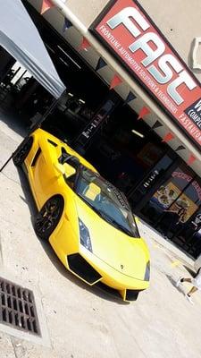 a customers Lamborghini Gallardo in front of Fast Automotive