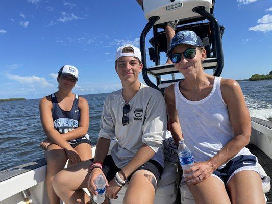 Happy wife and kids retiring to the dock after catching a ton of fish and a great morning out with Captain Pat.