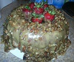 white almond praline cake with fresh strawberries