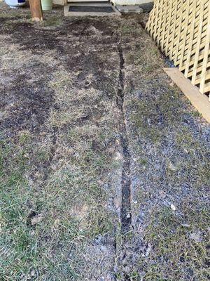 Mud track from wheeling in the hot water heater from the front yard I'm not bringing it in from the back