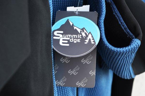 Summit Edge Outerwear brand label.