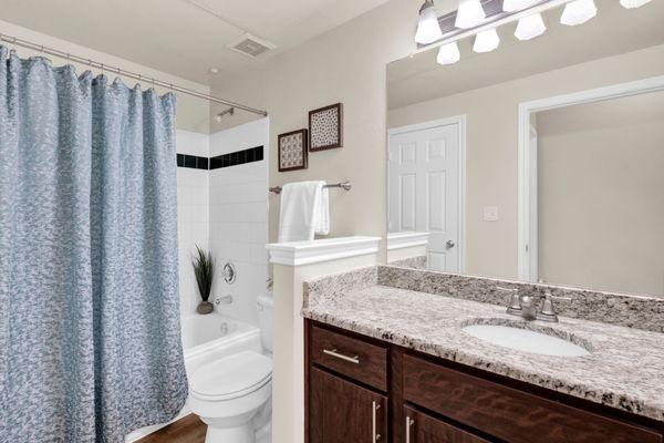 Bathroom with walk-in shower at The Estates of Northwoods