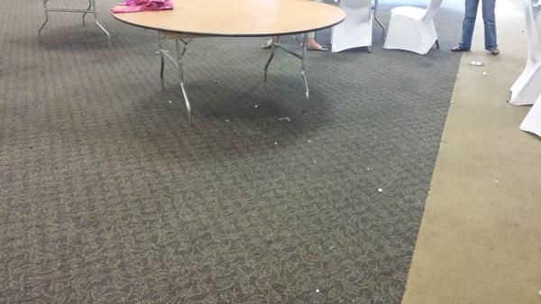 This is just one picture of what we walked into: bare tables, filthy floors, nothing in order!