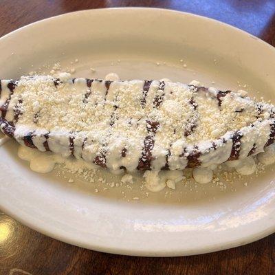 Stuffed plantain with queso and crema