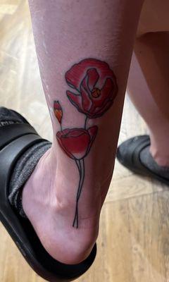 Poppy tattoo by Mark