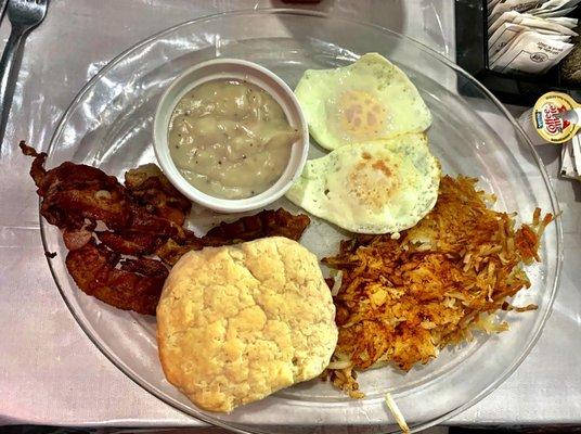 Small Breakfast: 2 Eggs, Bacon, Hashbrowns and Biscuit and Gravy. Very good! Gravy tastes like it's from a package but still really good.